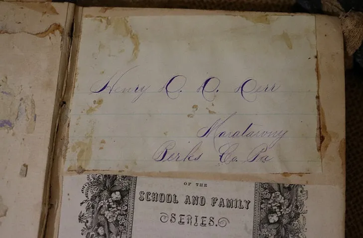 Child's Reader Wilson dated 1860 and Book Light
