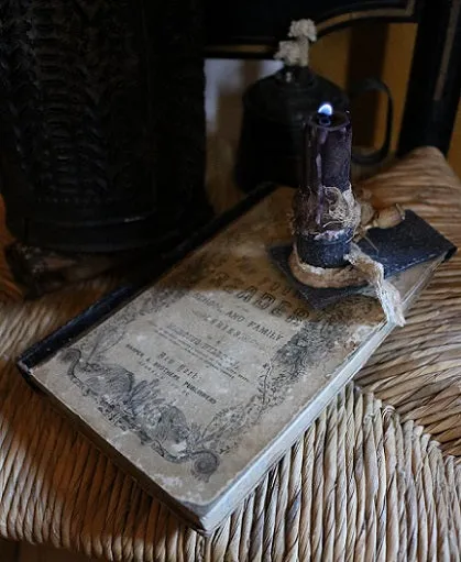 Child's Reader Wilson dated 1860 and Book Light