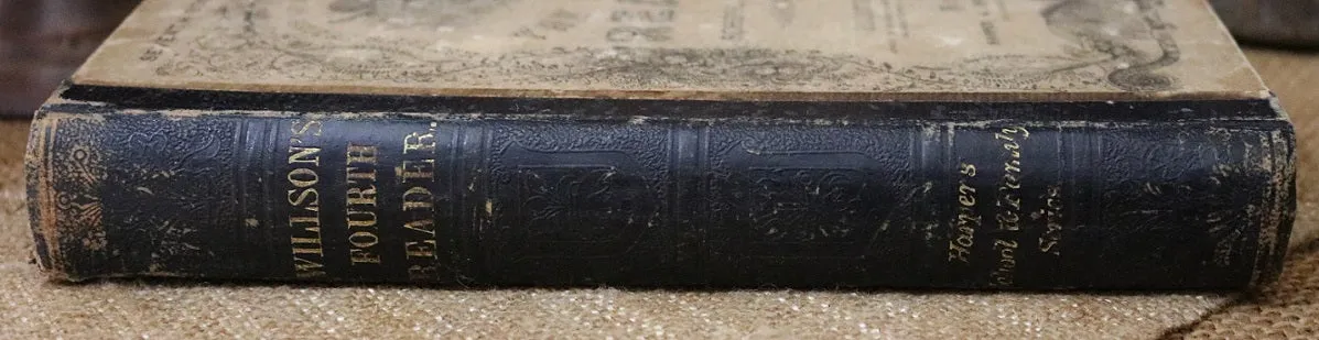 Child's Reader Wilson dated 1860 and Book Light