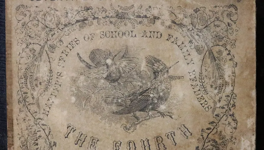 Child's Reader Wilson dated 1860 and Book Light